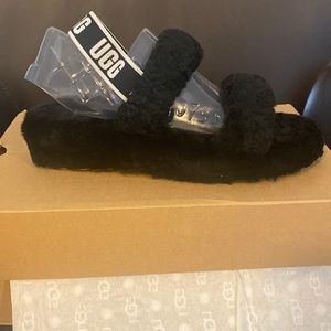 Brand new Ugg slides called “Oh Yeah “ black in white .woman’s size 11